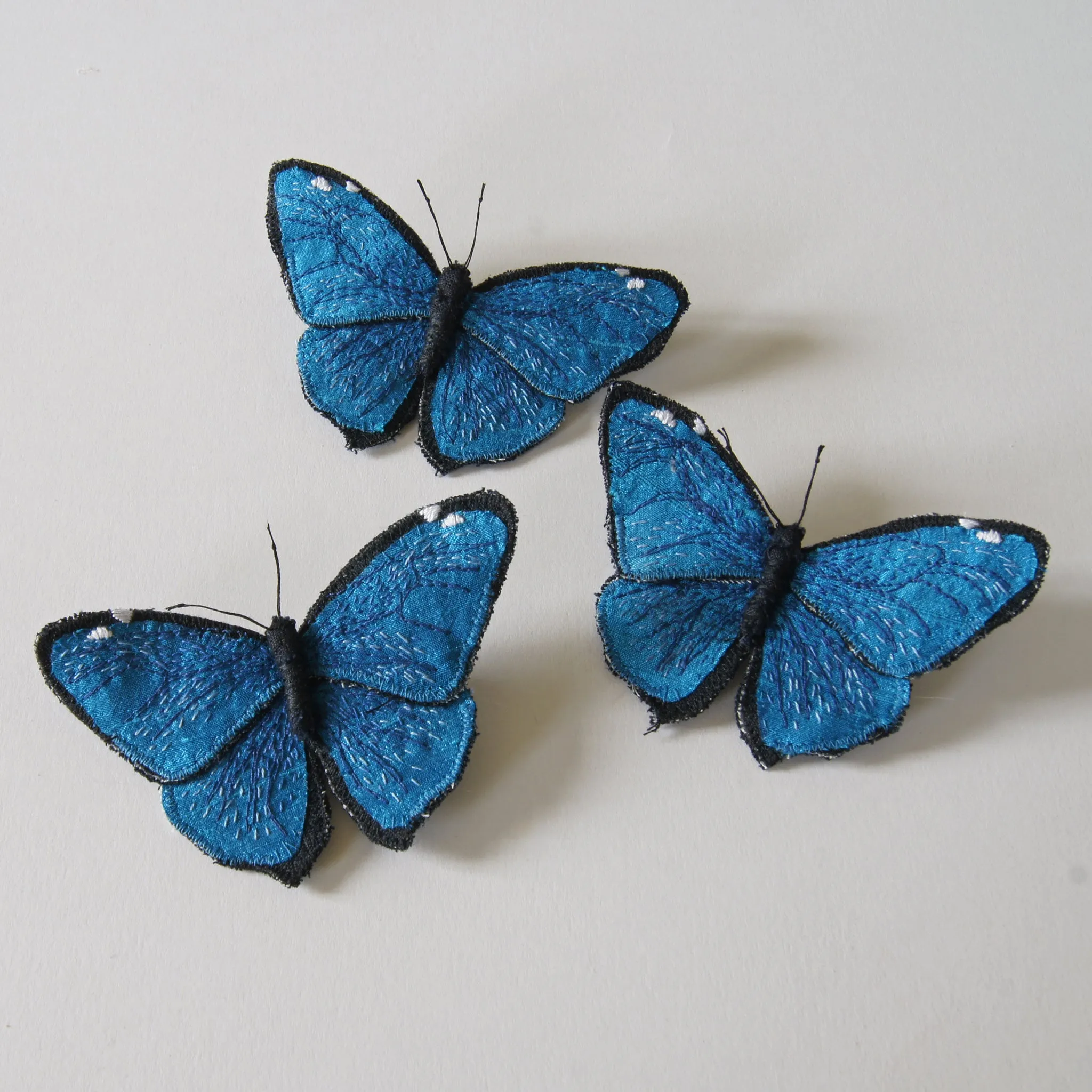 Adonis morpho fiber art brooch