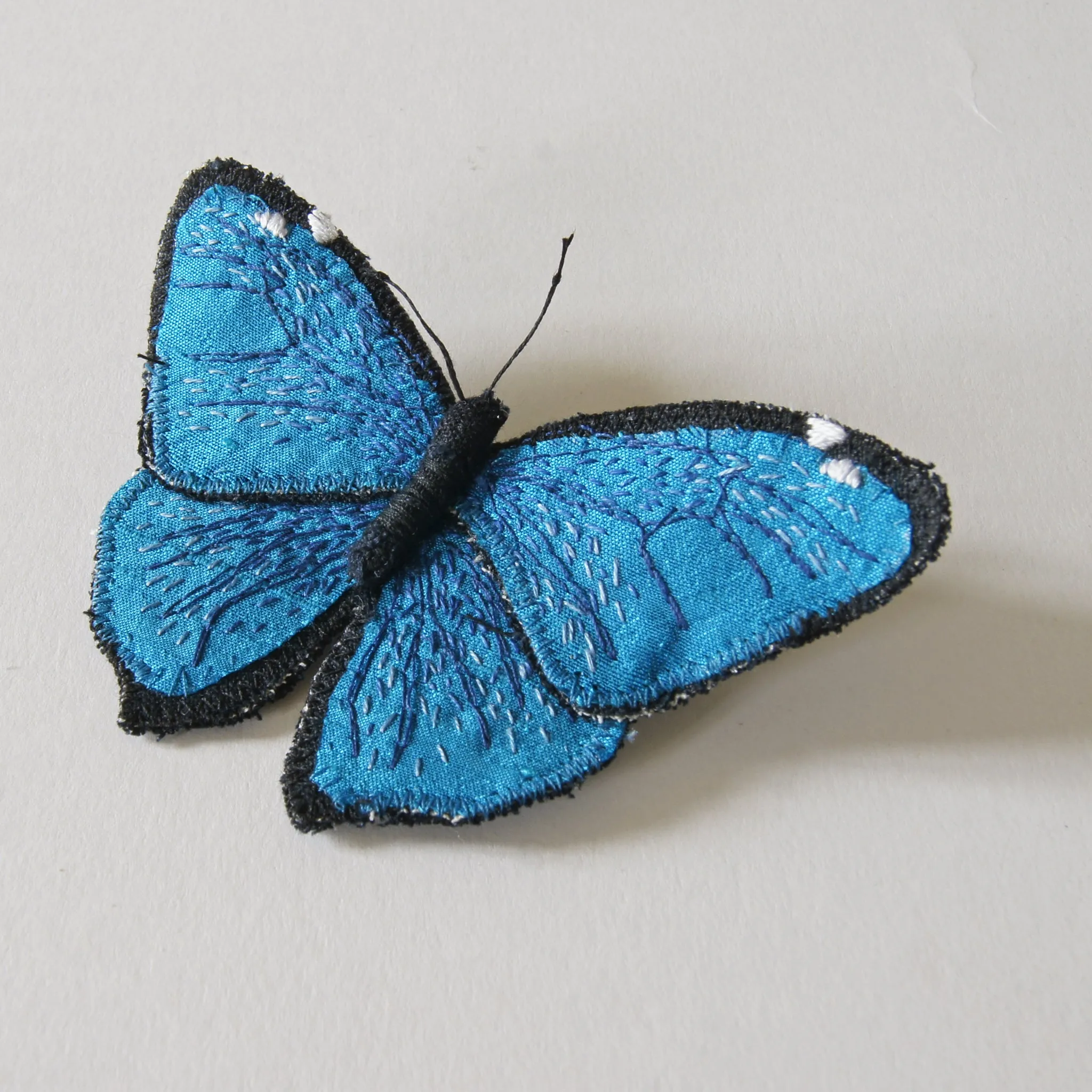 Adonis morpho fiber art brooch