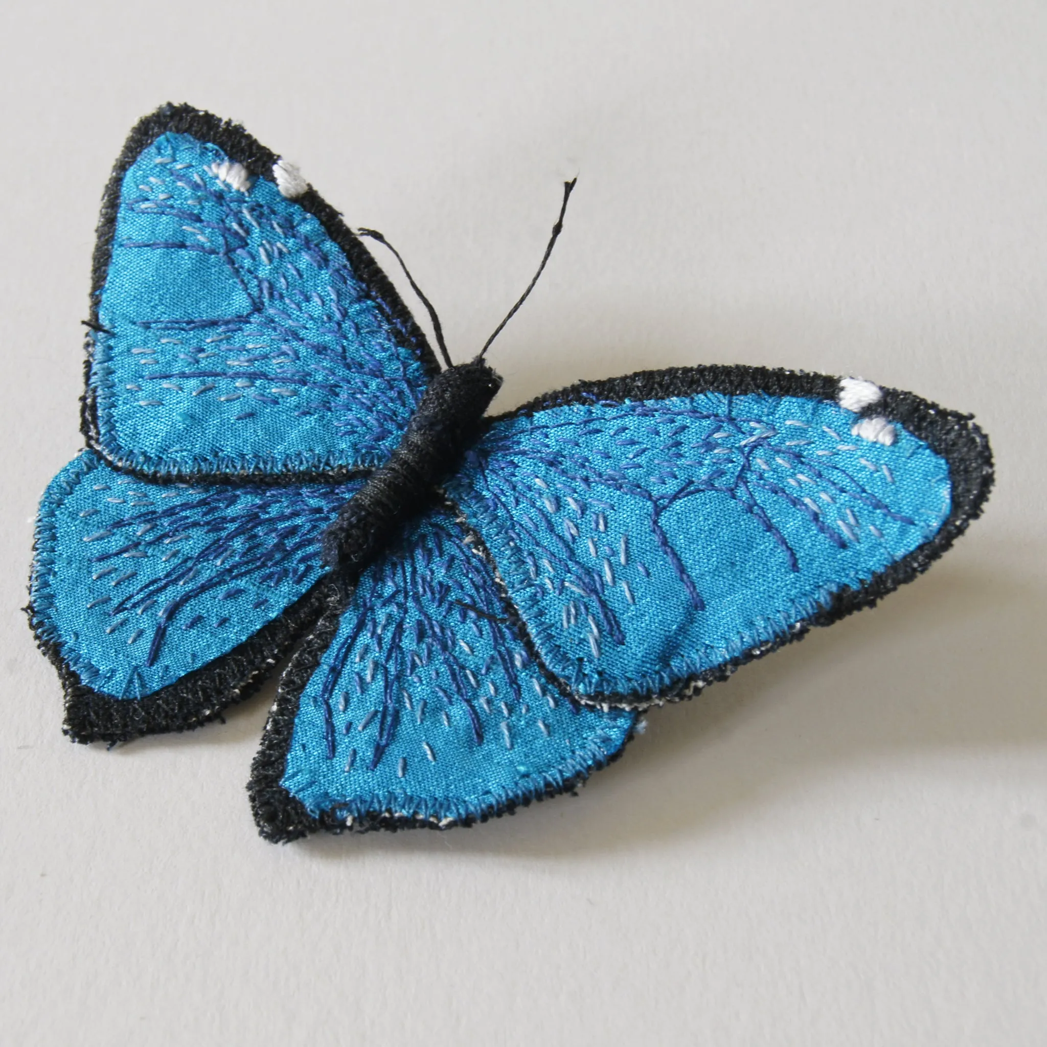 Adonis morpho fiber art brooch