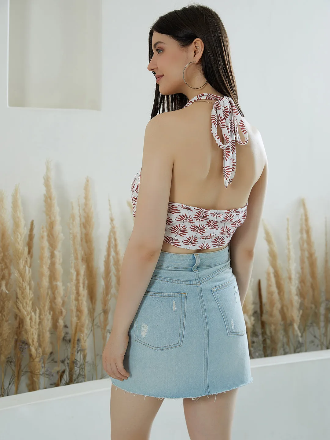 Berrylush Women White & Maroon Leaf Printed Halter Neck Sleeveless Tie-Up Backless Cotton Crop Top