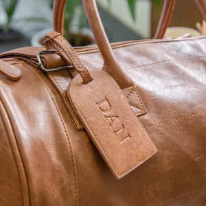 Faux Leather Barrel Bag With Personalised Luggage Tag